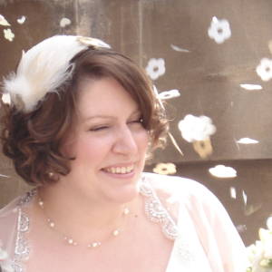 Daisy wearing one of Alison's bespoke hats for her wedding.